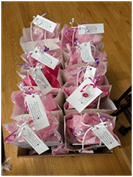 Dressing up and delivering birthday cakes and gifts to patients